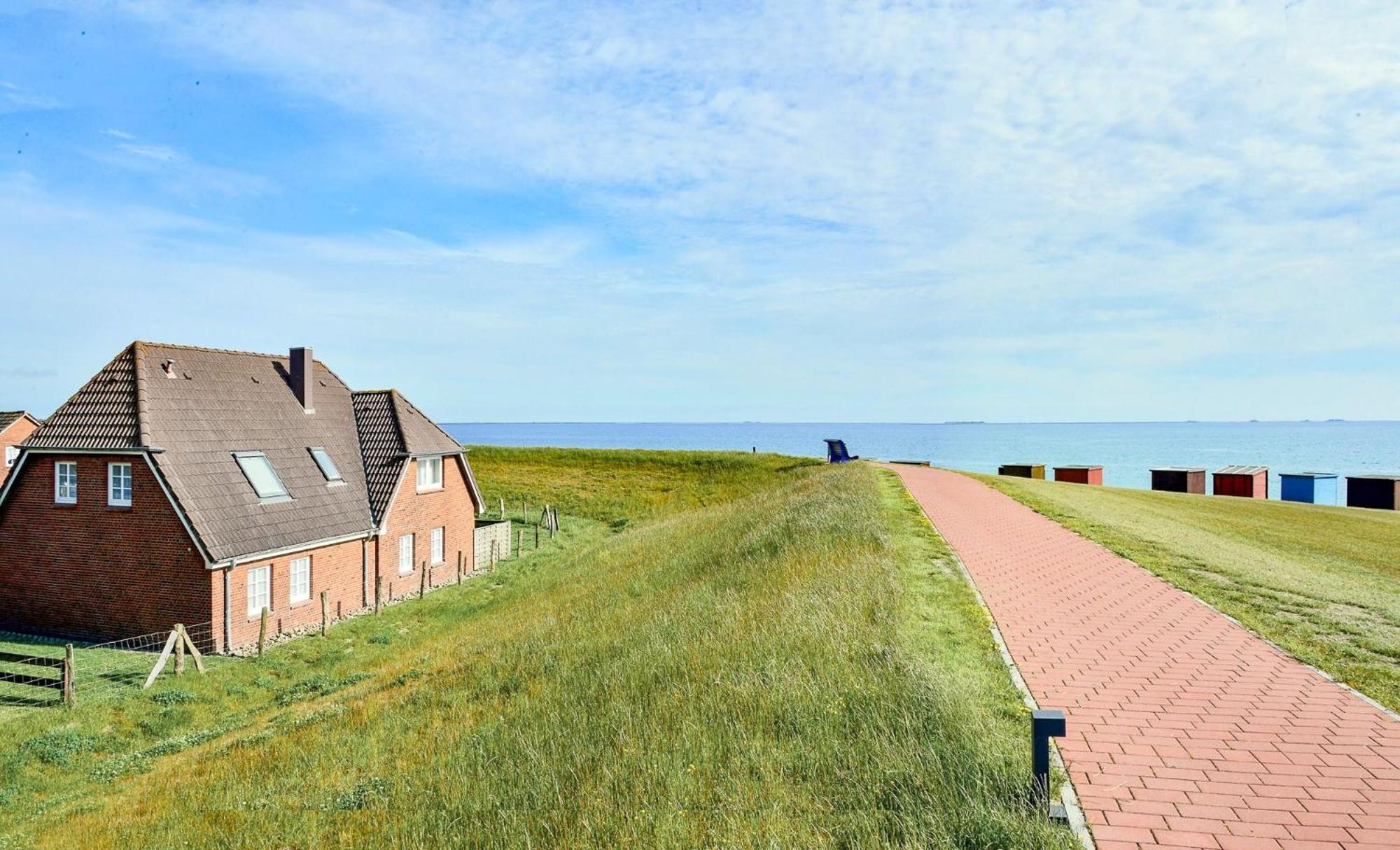 Direkt Am Deich - Ferienwohnung Amrum Im Gaestehaus Am Badedeich ดาเกอบึล ภายนอก รูปภาพ